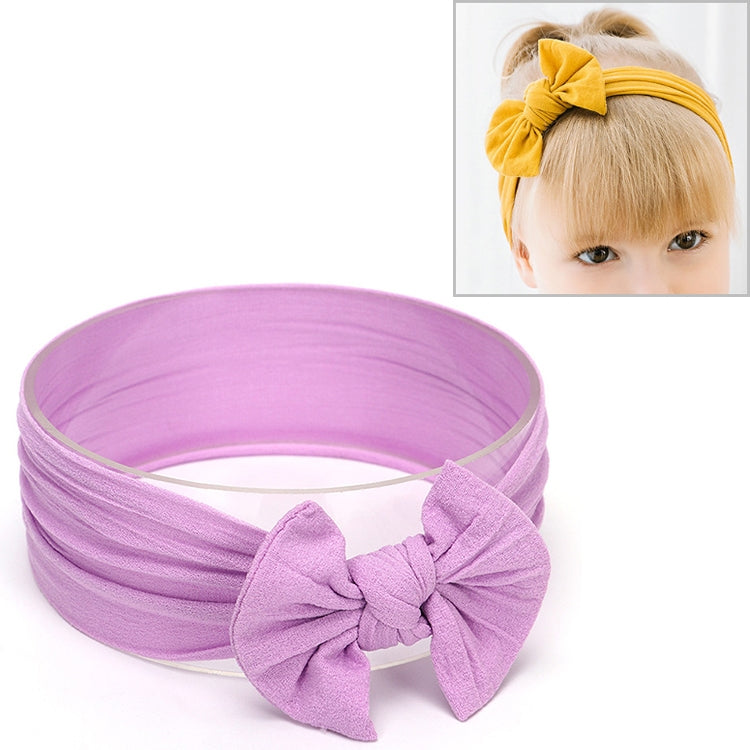 Purple infant bowknot headband with wide fabric band and large bow at center front