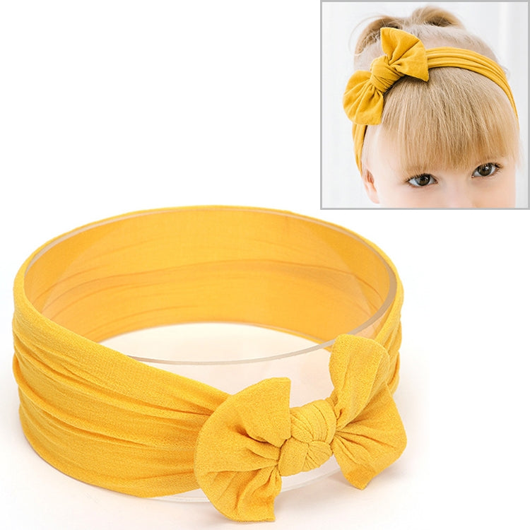 Yellow infant bowknot headband with wide fabric band and large bowknot front detail