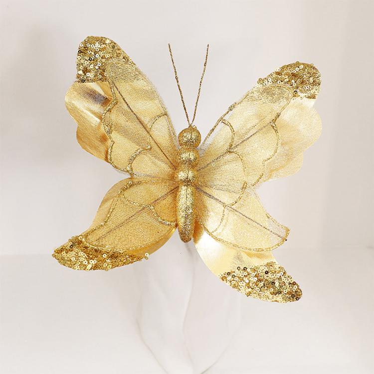Gold glitter butterfly ornament with detailed sequin wings and hanging loop