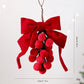 Red velvet bow pom-berry grape-cluster wreath ornament, hanging style