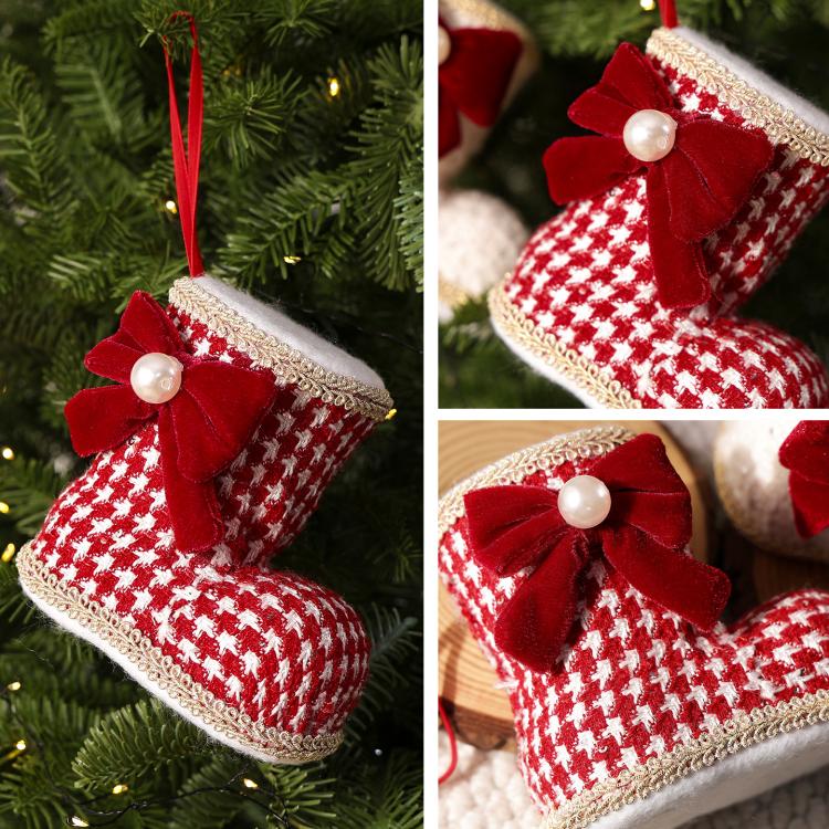 Hanging Christmas boot ornaments with red velvet bows and pearl beads—red plaid and white.