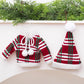 Mini knitted ornaments: green/white striped sweater and red striped hat with white trim.