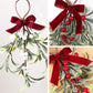 Mistletoe hanging ornament detail view with red velvet bow, red berries and white berry accents