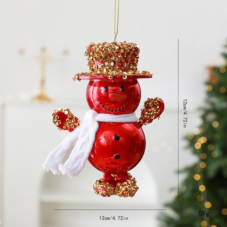 Red snowman ornament with gold glitter top hat, white scarf, and hanging loop