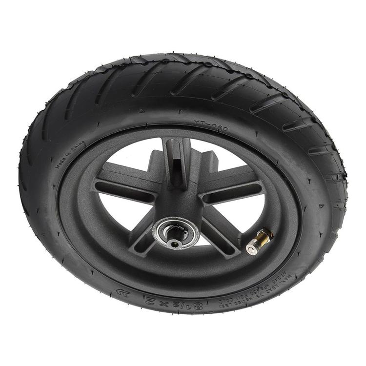 Rear scooter drive wheel with black pneumatic tire, gray rim and hub