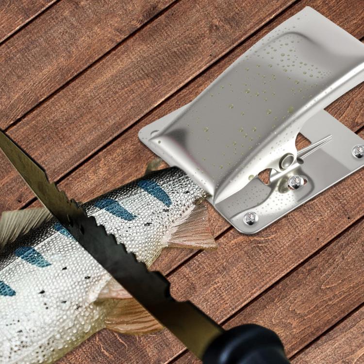 Stainless steel fish fillet clamp securing a fish fillet on a wooden cutting board