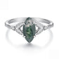Sterling silver ring featuring a green marquise agate stone and braided leaf shank details