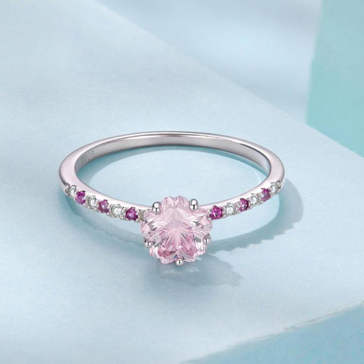 Sterling silver cherry blossom ring with pink floral center and pavé stones