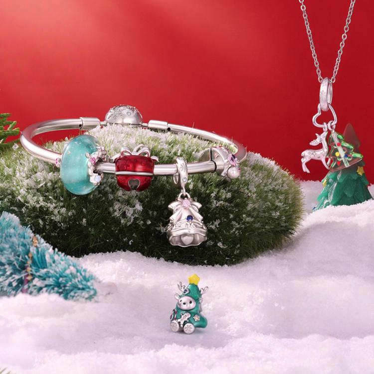 Charm bracelet with aqua and red beads plus Christmas tree and bell charms