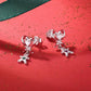 Sterling silver earrings with candy-cane heart studs and dangling gingerbread charms