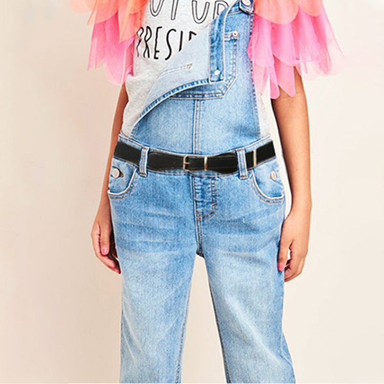 Kids dark adjustable belt with square pin buckle worn on denim jeans