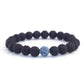 Black lava bead bracelet with light blue crackle centerpiece bead