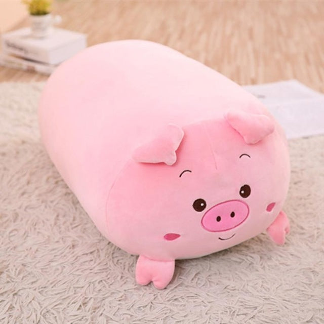 Pink pig plush cushion pillow with round cheeks and smiling face