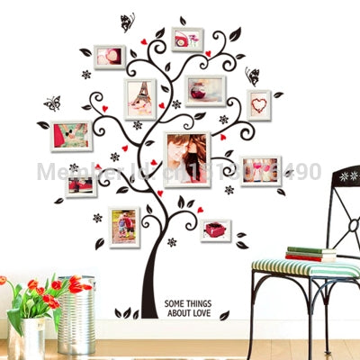 Photo tree wall sticker with black branches, heart accents, and red photo picture frames