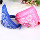 Pink and blue printed dog bandana collars with adjustable straps and metal buckles