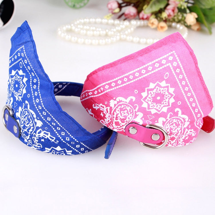 Pink and blue printed dog bandana collars with adjustable straps and metal buckles