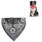 Black printed dog bandana collar with white paisley pattern and metal buckle