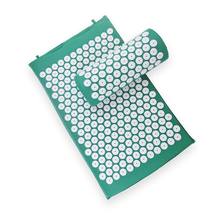 Green acupuncture massage pad with white circular acupoints and matching rolled pillow