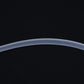 Clear translucent silicone air pump hose tubing close-up of curved section
