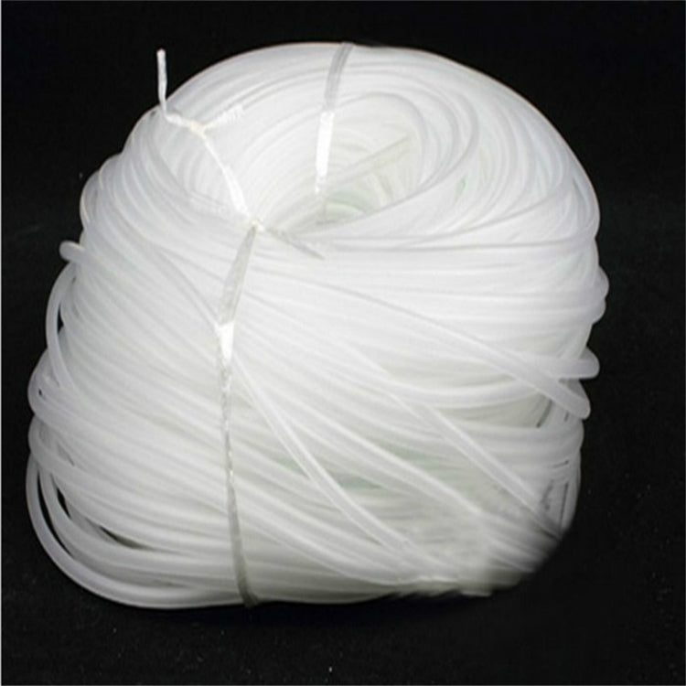 White silicone air hose tubing, tightly wound coil with two short ends