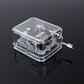 Clear acrylic DIY music box with winding handle and exposed mechanism, side view