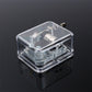 Clear acrylic DIY music box with exposed mechanism and crank handle, close front view