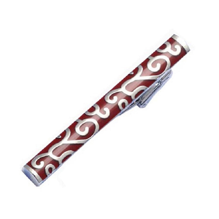 Red enamel tie clip with white ornate design and silver ends