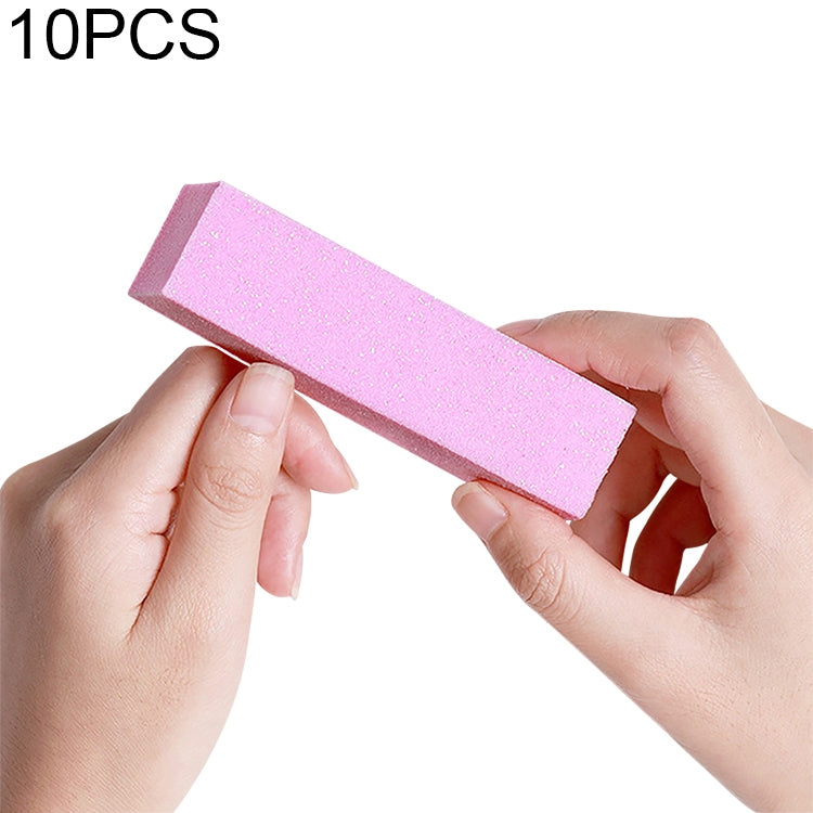 Pink nail sanding/buffing block foam rectangle, held between fingers