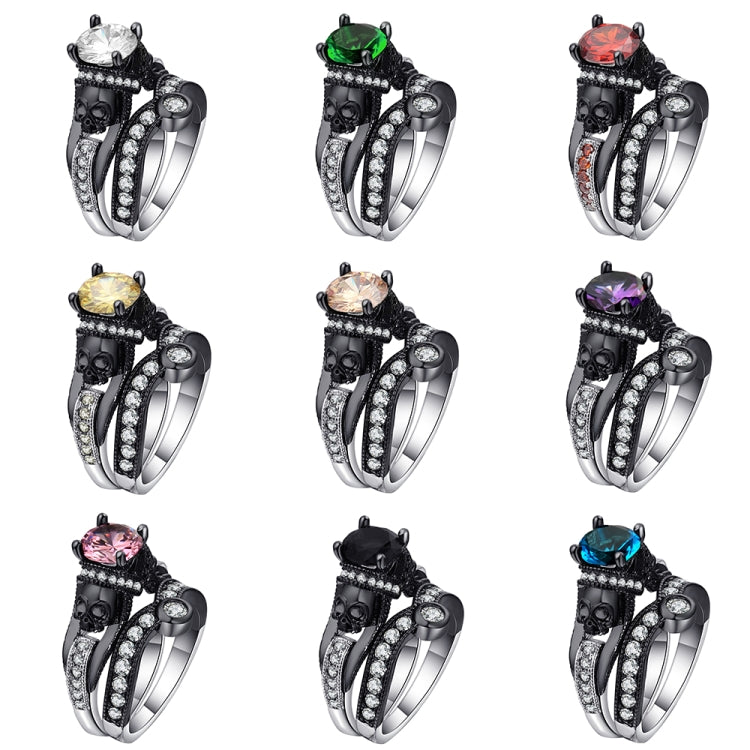 Set of punk skull rings in multiple colors, featuring black enamel and silver stone bands
