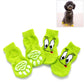 Set of pet knitted anti-slip socks in bright green with cartoon puppy face patches