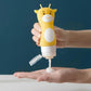 Giraffe-shaped travel lotion bottle in hands with clear pump nozzle