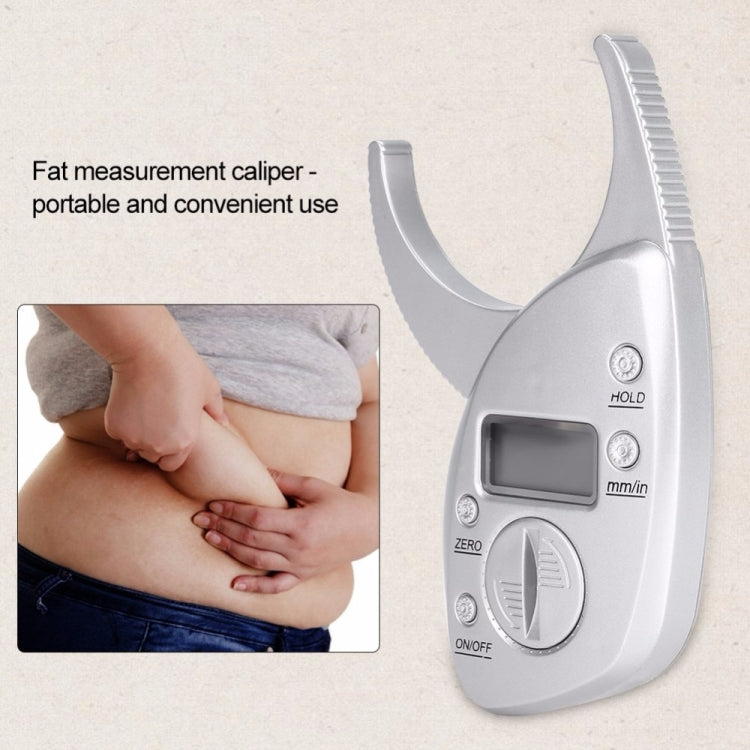 Silver digital fat measurement caliper with LCD screen and grip buttons