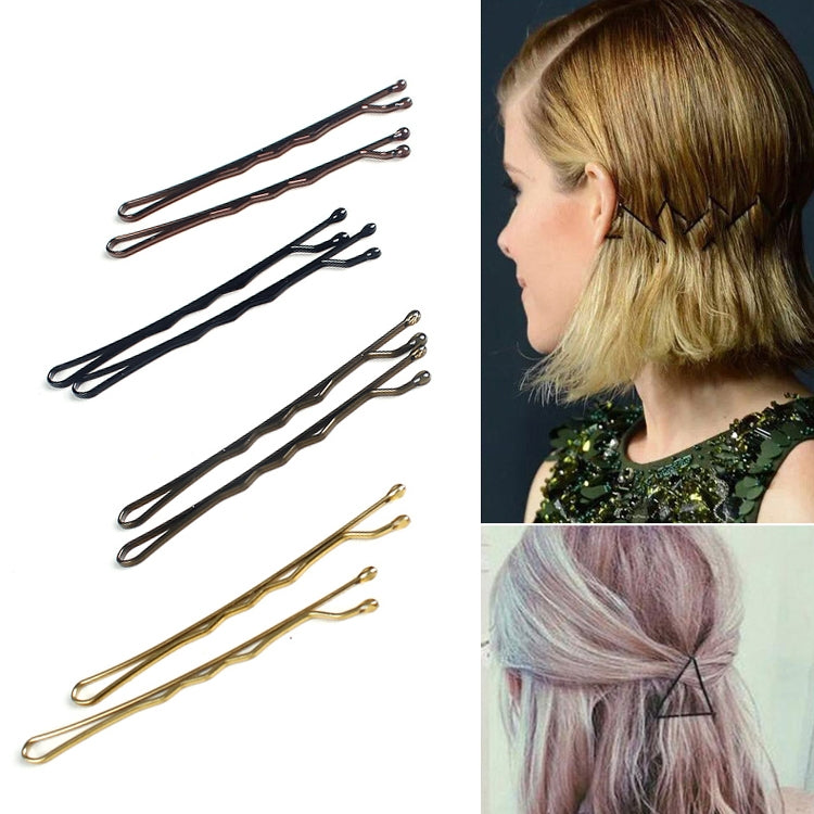Hair barrette clips set shown on hair, with black and gold tones