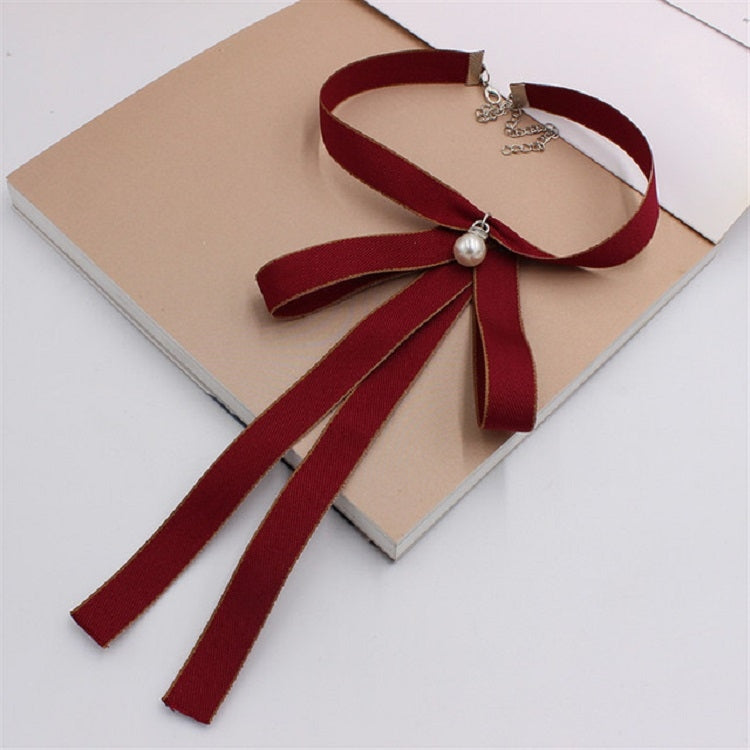 Women’s red wine ribbon bow tie with pearl center, long tails, and silver-tone chain