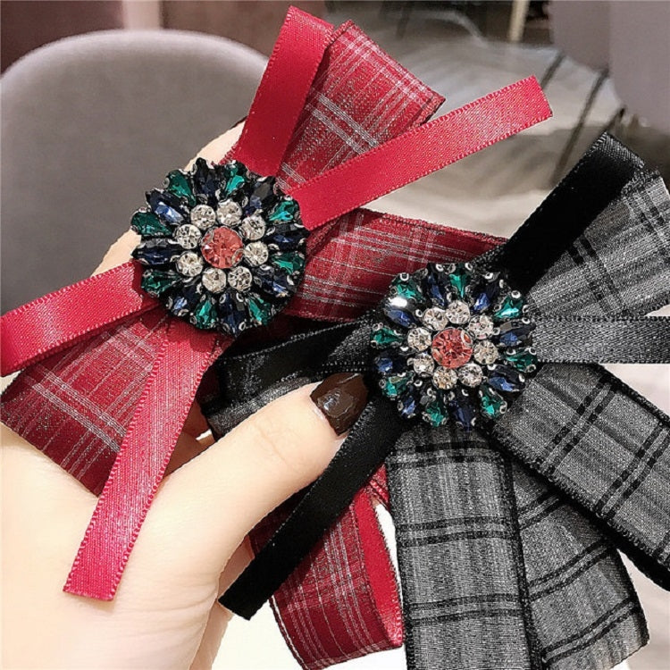 Red and gray plaid bow brooches with jeweled centers, satin ribbon bows
