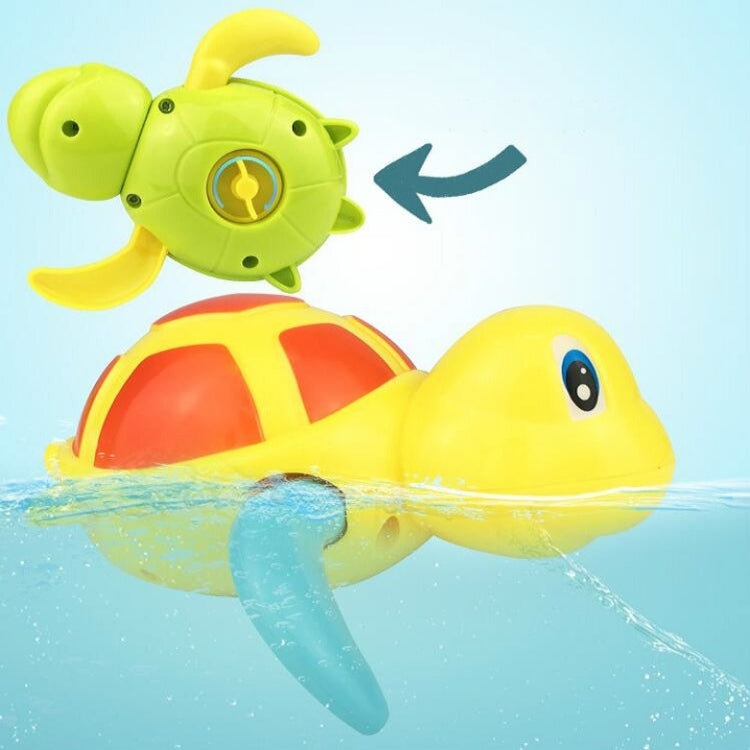 Yellow and red cartoon turtle bath water toy with dolphin-style fins