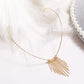 Gold wire headband with long beaded fringe tassel and small round charm