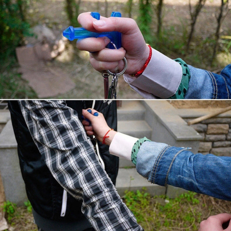 Hand holding blue translucent finger stinger self-defense tool keychain