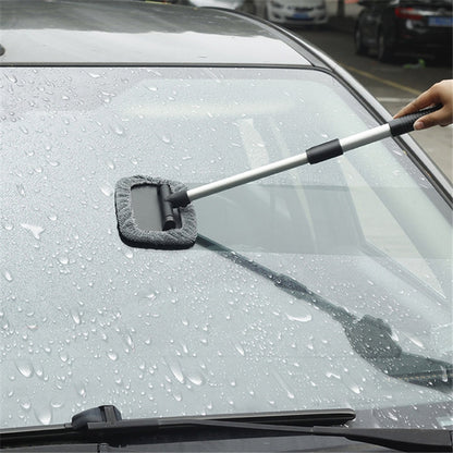 Telescopic windshield cleaning brush with gray microfiber wipe and black handle