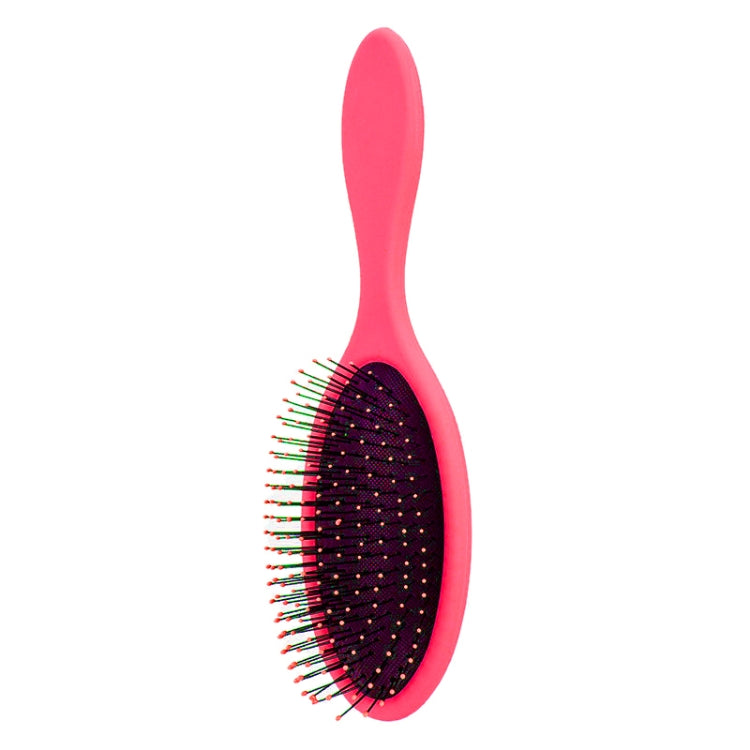 Pink oval scalp massaging hair brush with pin bristles on black pad