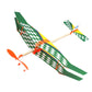 Green checkered DIY rubber-powered plane glider toy with orange propellers and wing details.
