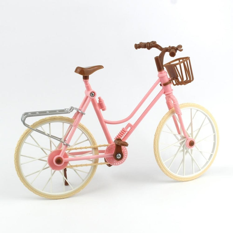Mini dollhouse bicycle with pink frame, tan wheels, brown rear stand and front guard