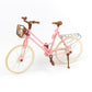 Mini dollhouse bicycle with pink frame, tan wheels, brown handlebar, front basket