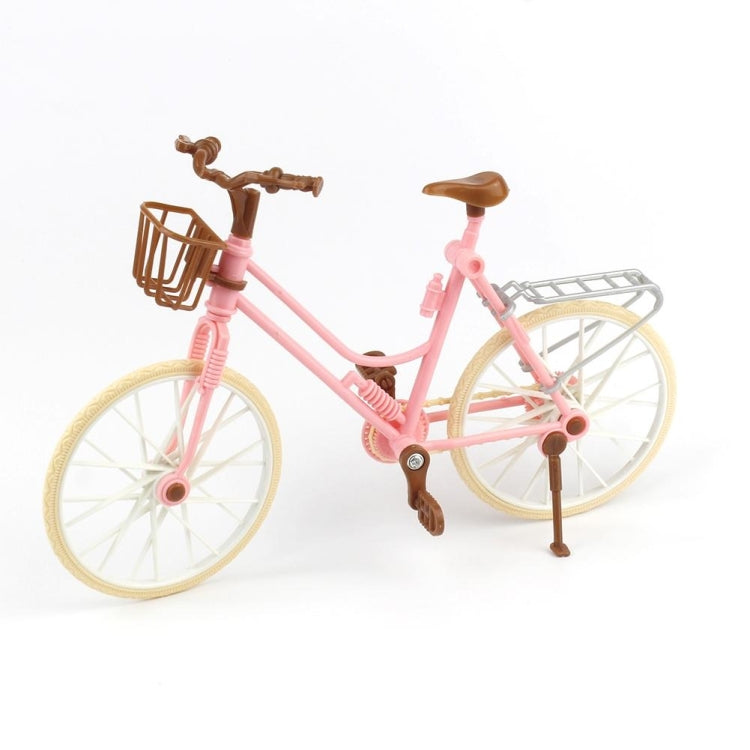 Mini dollhouse bicycle with pink frame, tan wheels, brown handlebar, front basket
