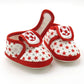 Baby prewalker shoes in red with star pattern and soccer patch, slip-on design