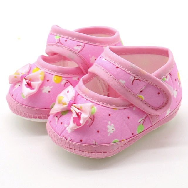 Pink baby infant flats with wide strap and bow, soft sole prewalker shoes