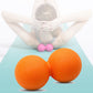 Orange silicone massage ball pair, bumpy texture for stretching and relief