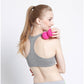 Pink silicone massage ball held in hand for fitness and self-massage