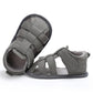 Grey toddler canvas sandals with Velcro strap top and flexible rubber sole