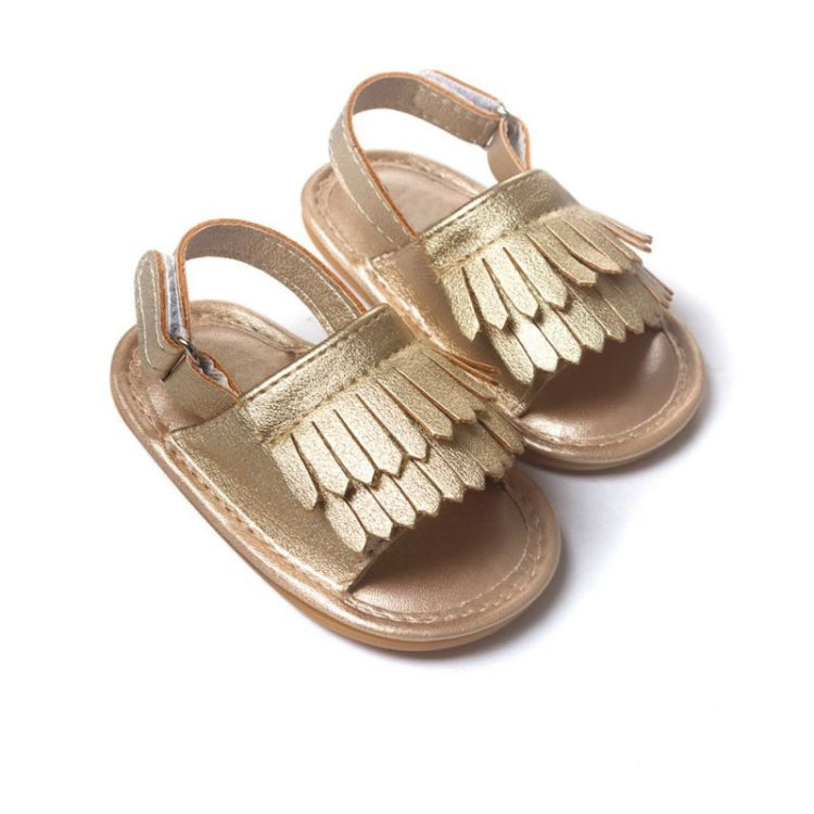 Gold-toned fringed baby sandals with hook-and-loop ankle strap and open toe